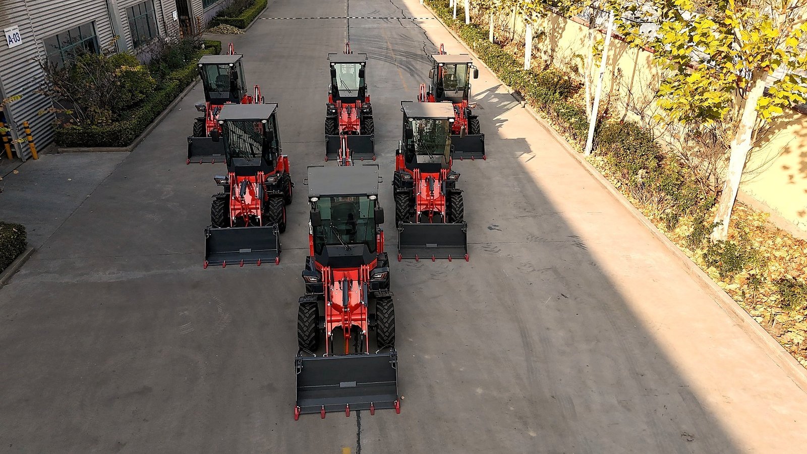 Red machines — backhoe loader