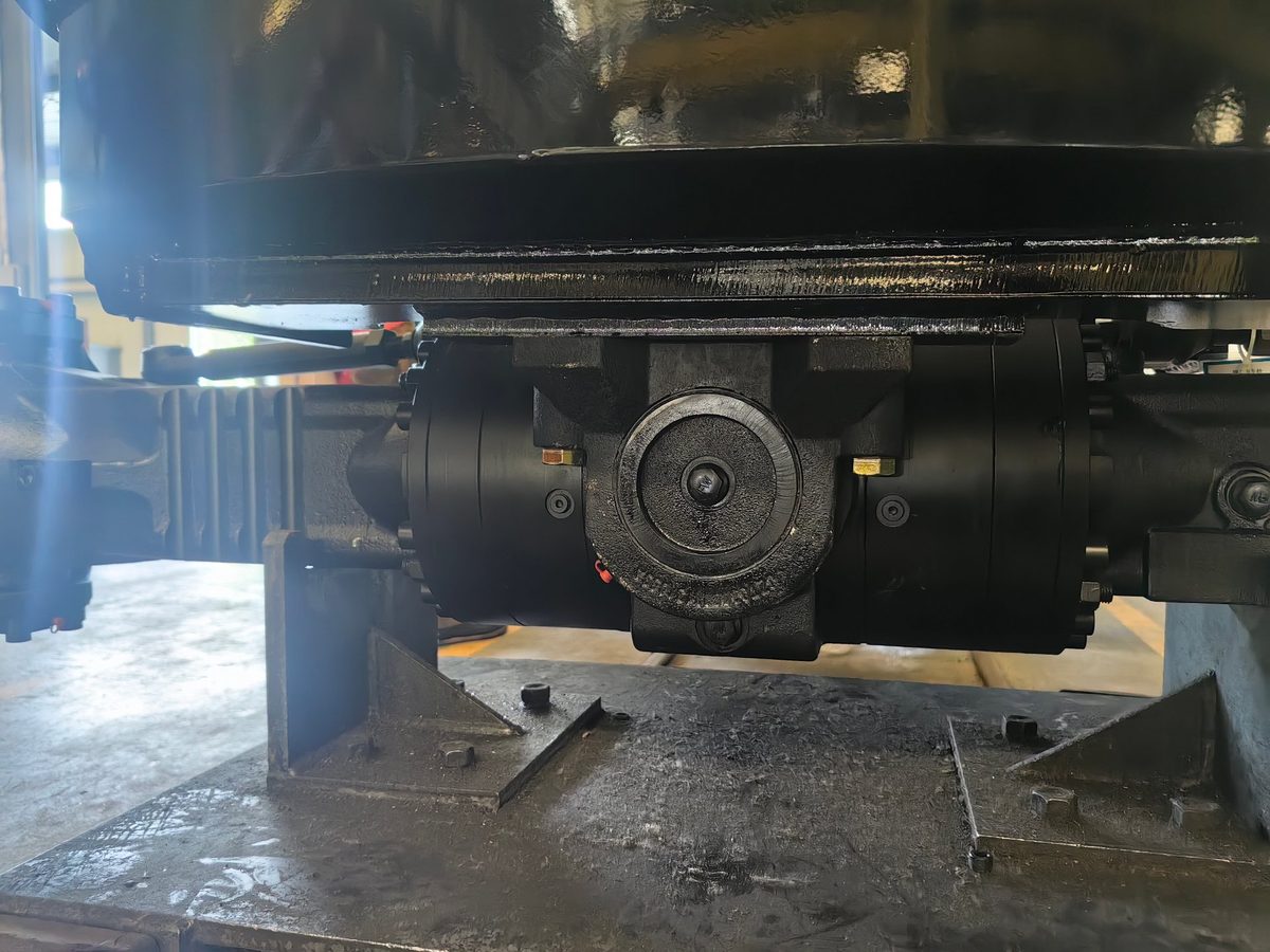 Wet drive axle side view showing the sealed housing and cooling design
