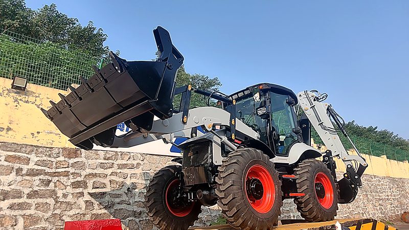 Single backhoe loader on the test platform for full cycle check